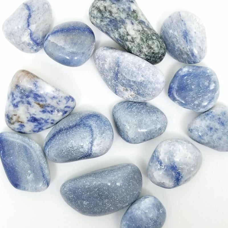 Blue Quartz tumbled stones on white background