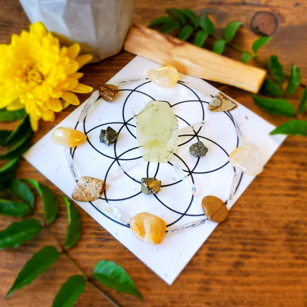 A beautifully laid out crystal grid ritual that was created to help you get clear on what you want out of life and make it your new reality. Manifest Your Intention Crystal Grid Ritual Kit includes: One (1) Citrine Point Four (4) Tumbled Desert Jasper Four (4) Tumbled Yellow Jasper Four (4) Raw Pyrite Ten (10) Quartz Laser Points One (1) Crystal Grid 0n Seed Paper One (1) Palo Santo Stick One (1) Instruction Booklet